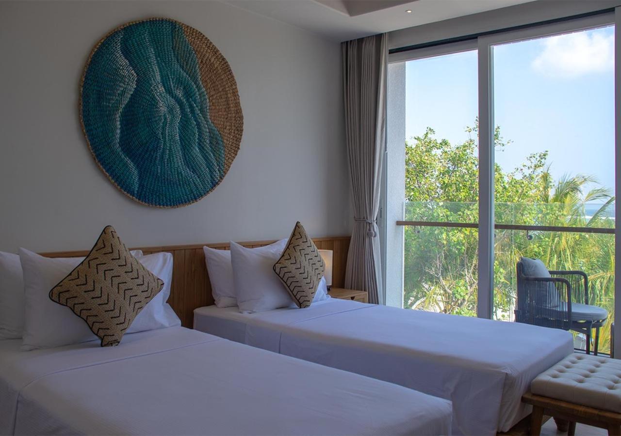 Stone Beach Club Dhiffushi Bagian luar foto